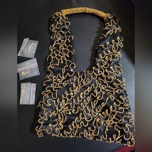 Chic Black Bag with Gold Embellishments